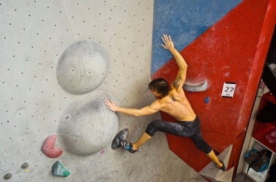 This is a picture of a guy climbing at Arkoze, which is nice activity to do in Paris.