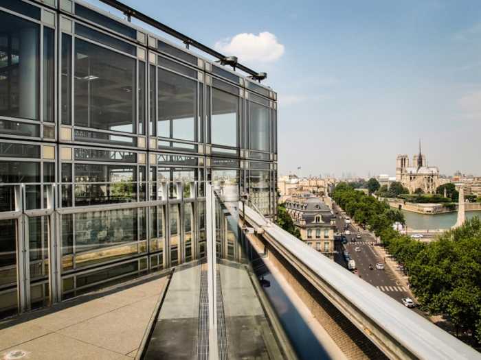 This is a picture of a terrace in Paris where we can see Notre Dame.