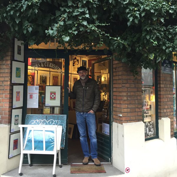 This is a picture of Librairie Louis Rozen, which is a nice place to visit in Paris.