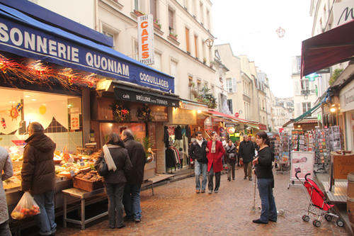 This a a picture of the marché Mouffetard in Paris.