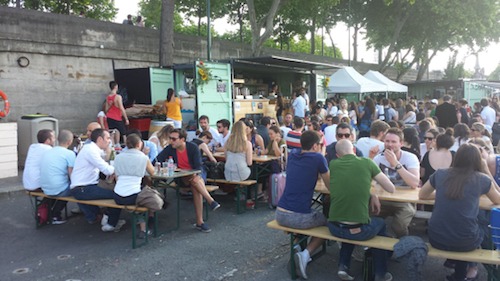 People sitting on a terrace in Paris.