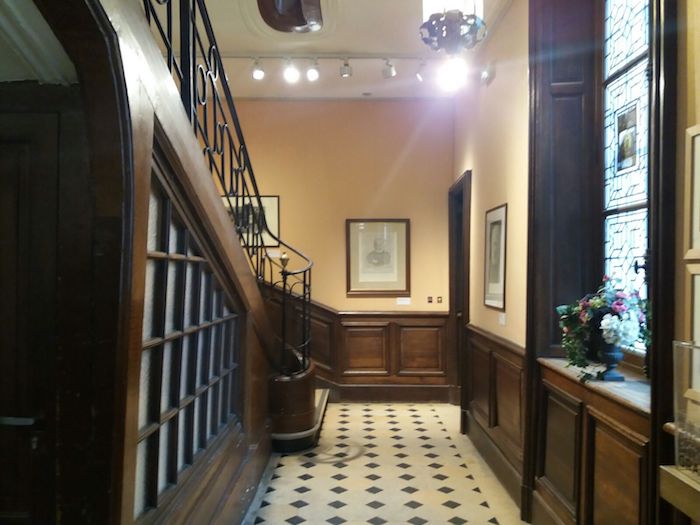 This is a picture of stairs inside the maison de victor Hugo at Paris.