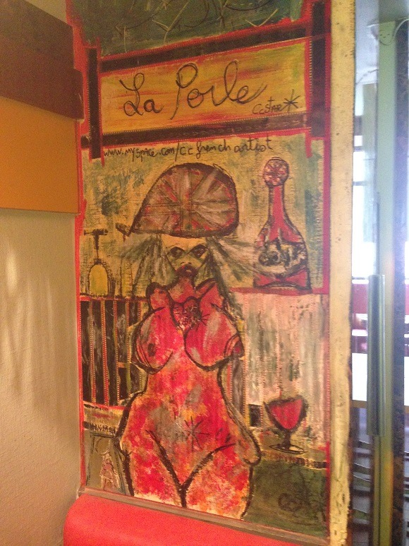 Picture of a painting in a nice cafe in Paris